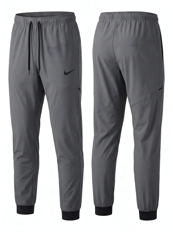 Jogger Nike Swift Run – Gris Carbón